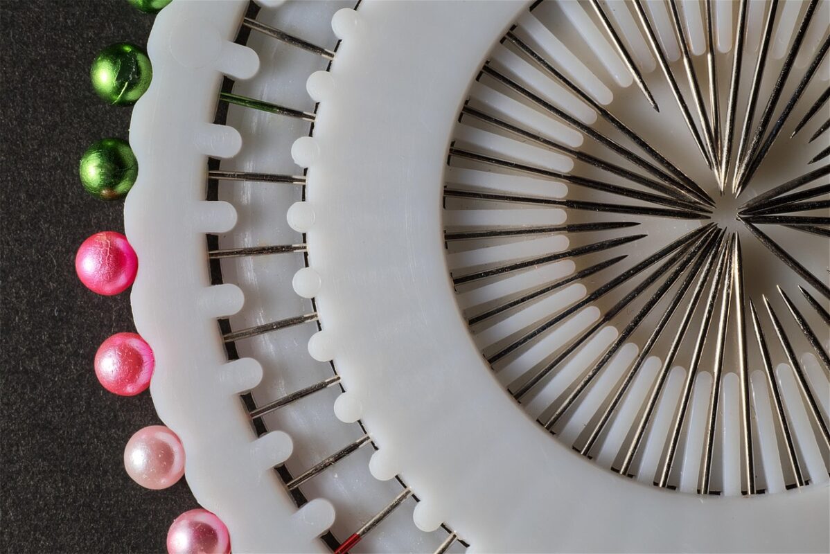 A magnetic pin holder with straight pins on it